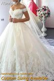 Luxury Lace Boat Neck Ball Gown Wedding Dresses Sweetheart Sheer Back Princess Illusion Applique Bridal Gowns Casamento