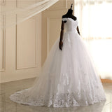 Luxury Lace Boat Neck Ball Gown Wedding Dresses Sweetheart Sheer Back Princess Illusion Applique Bridal Gowns Casamento